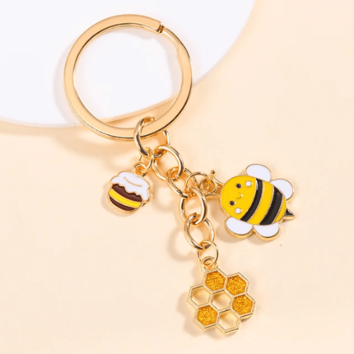 variante avec du miel, un rayon de miel et une abeille du Porte Clé Abeille