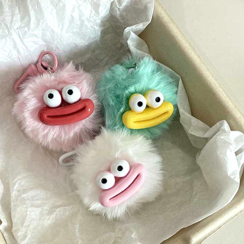 porte clé en peluche rose, blanc et vert